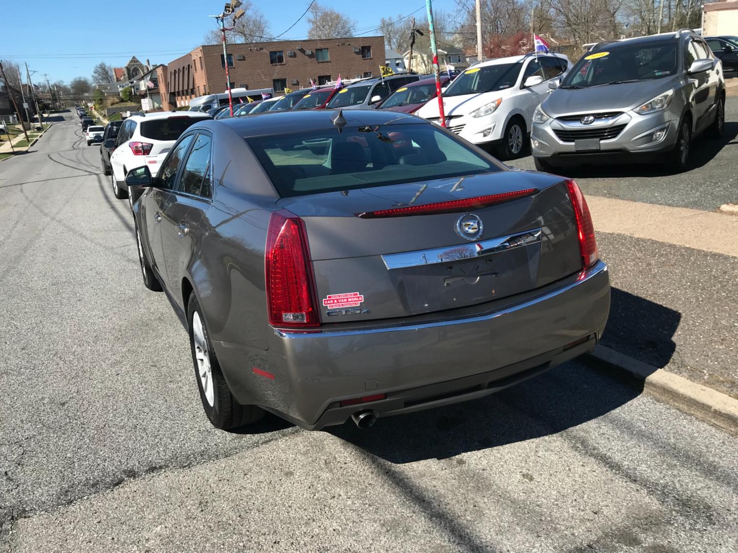 2012 Gray /Tan Cadillac CTS (1G6DC5E54C0) with an 3.0 V6 engine, Automatic transmission, located at 577 Chester Pike, Prospect Park, PA, 19076, (610) 237-1015, 39.886154, -75.302338 - 2012 Cadillac CTS: All wheel drive, sunroof, leather interior, new PA inspection, runs EXCELLENT! This vehicle comes inspected and has been given a bumper to bumper safety check. It is very clean, reliable, and well maintained. We offer a unique pay plan that is known for being the easiest and fa - Photo#5